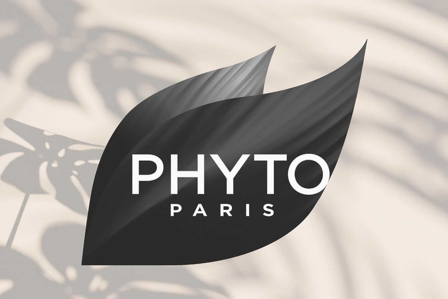 Phyto Paris logo with stylized leaf on light background with shadow effect.